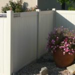 Tan vinyl privacy fence with 5.5 rail in Orem, Utah
