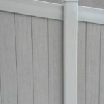 Wood grain vinyl privacy fence